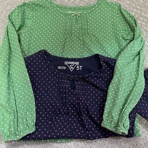 OshKosh lot of three cotton shirts. Size 5T. Lot of 3 tops. In great condition.